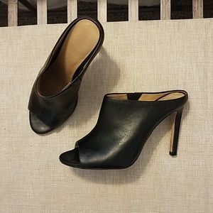 Women's, he heeled mules.  Size 6, black.